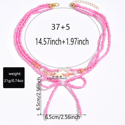Beaded Three-Layered Necklace with Bow and Starfish Charms