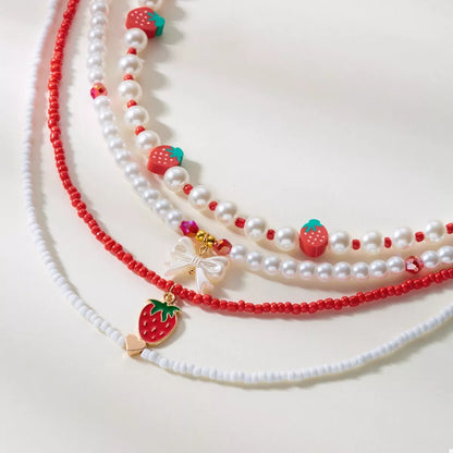 4 Piece Strawberry Pearl Beaded Necklace